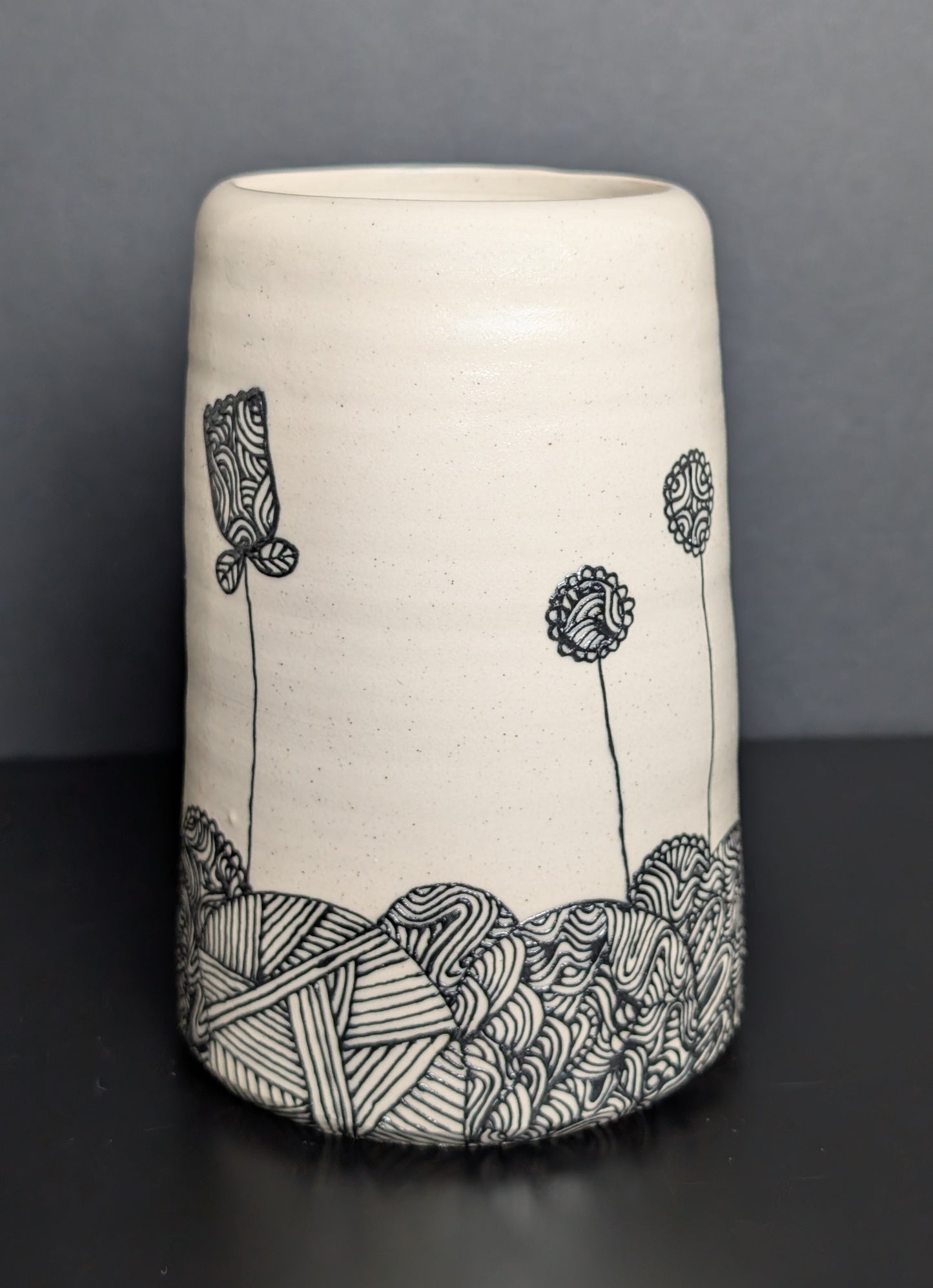 Black floral patterned landscape slip trailed bouquet vase
