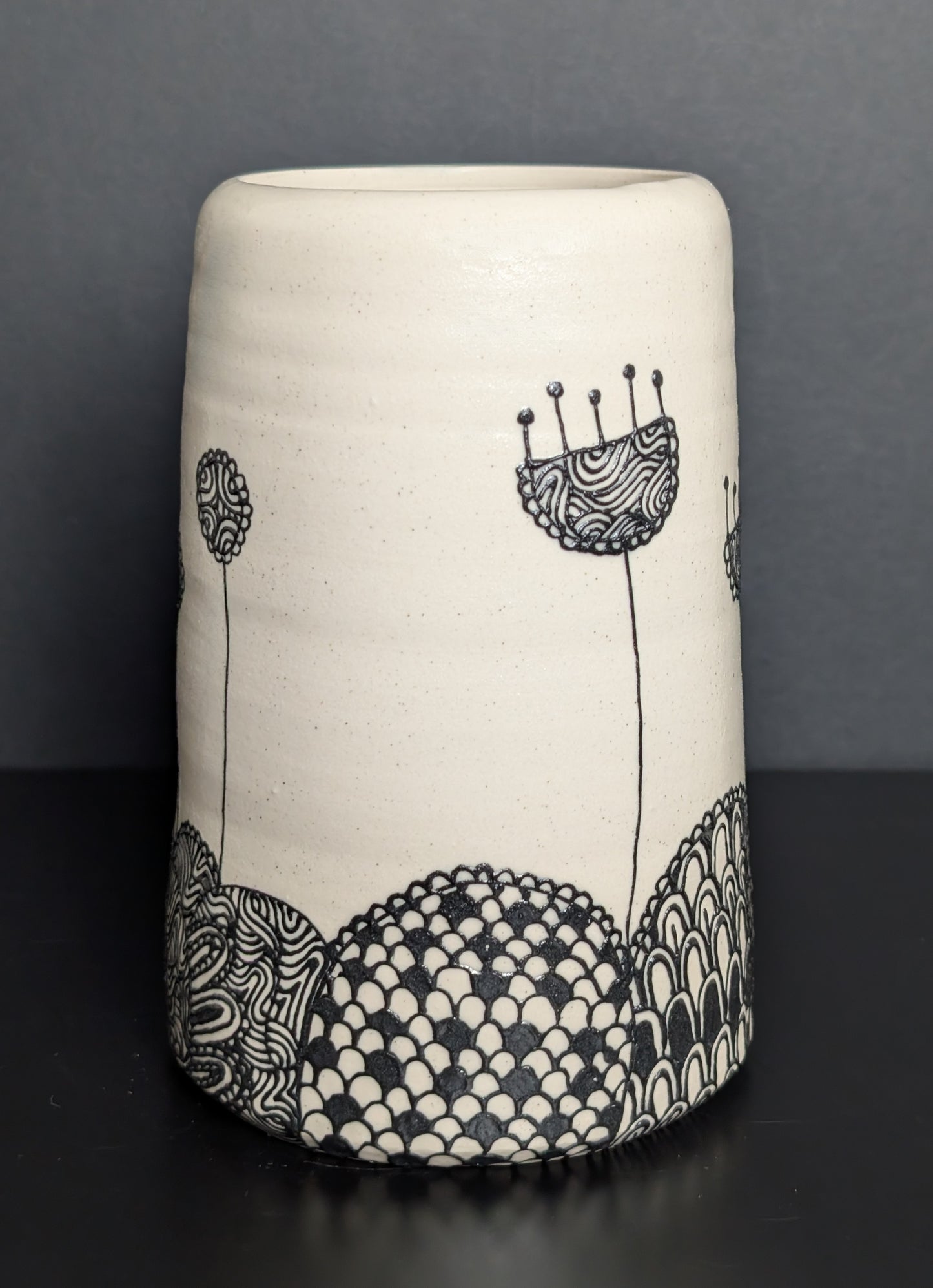 Black floral patterned landscape slip trailed bouquet vase