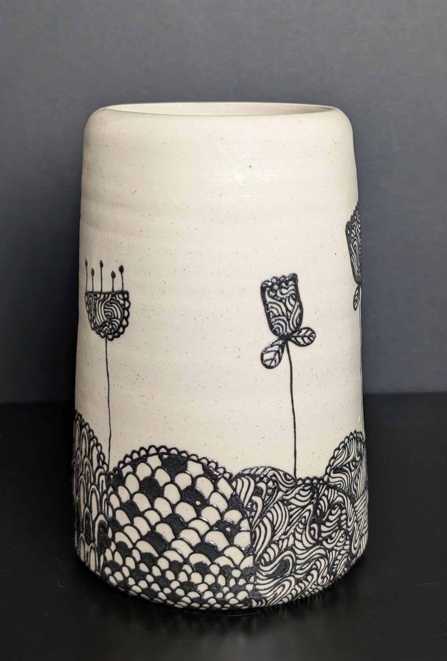 Black floral patterned landscape slip trailed bouquet vase