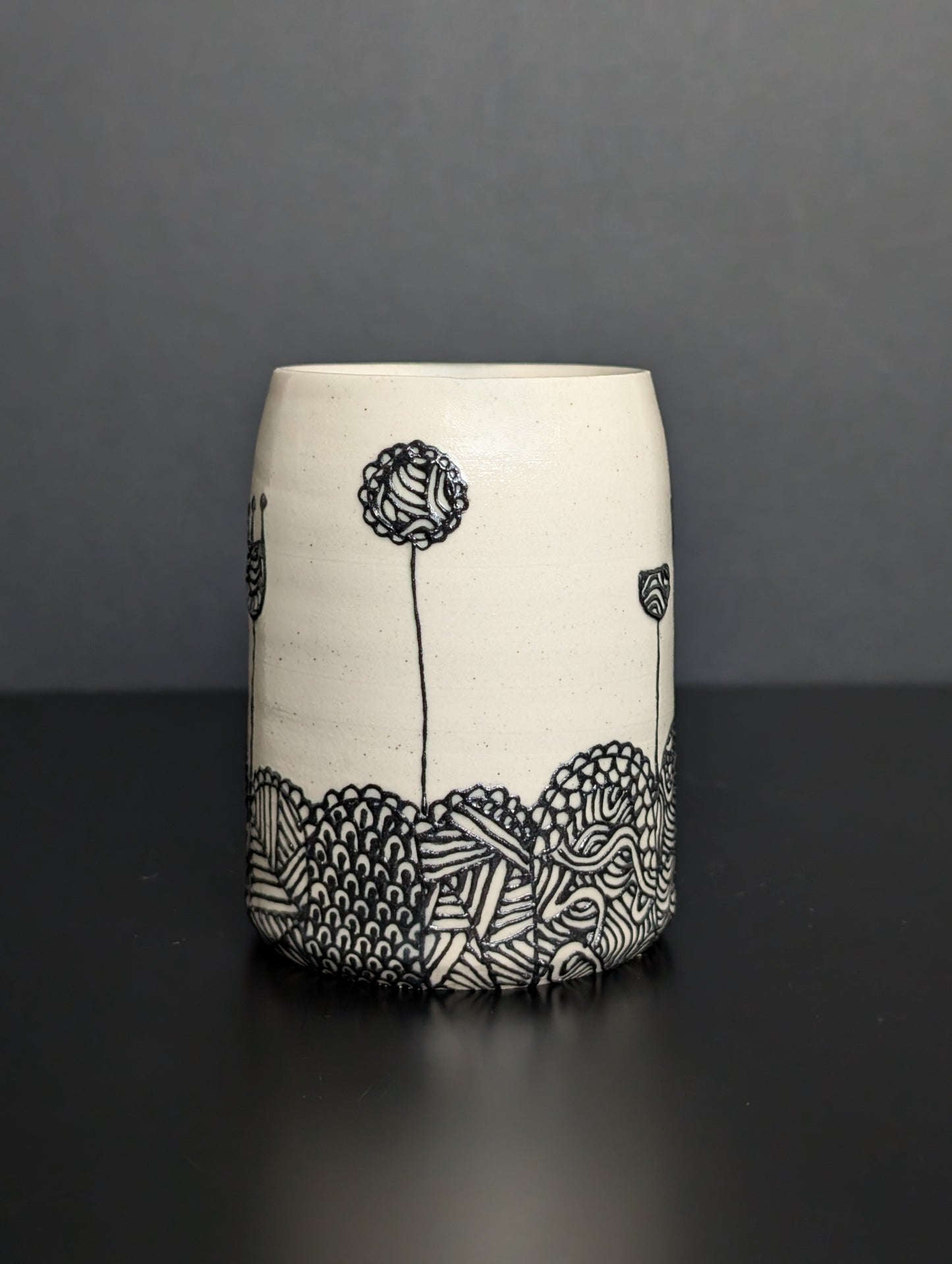 Black floral patterned landscape slip trailed mini bouquet vase
