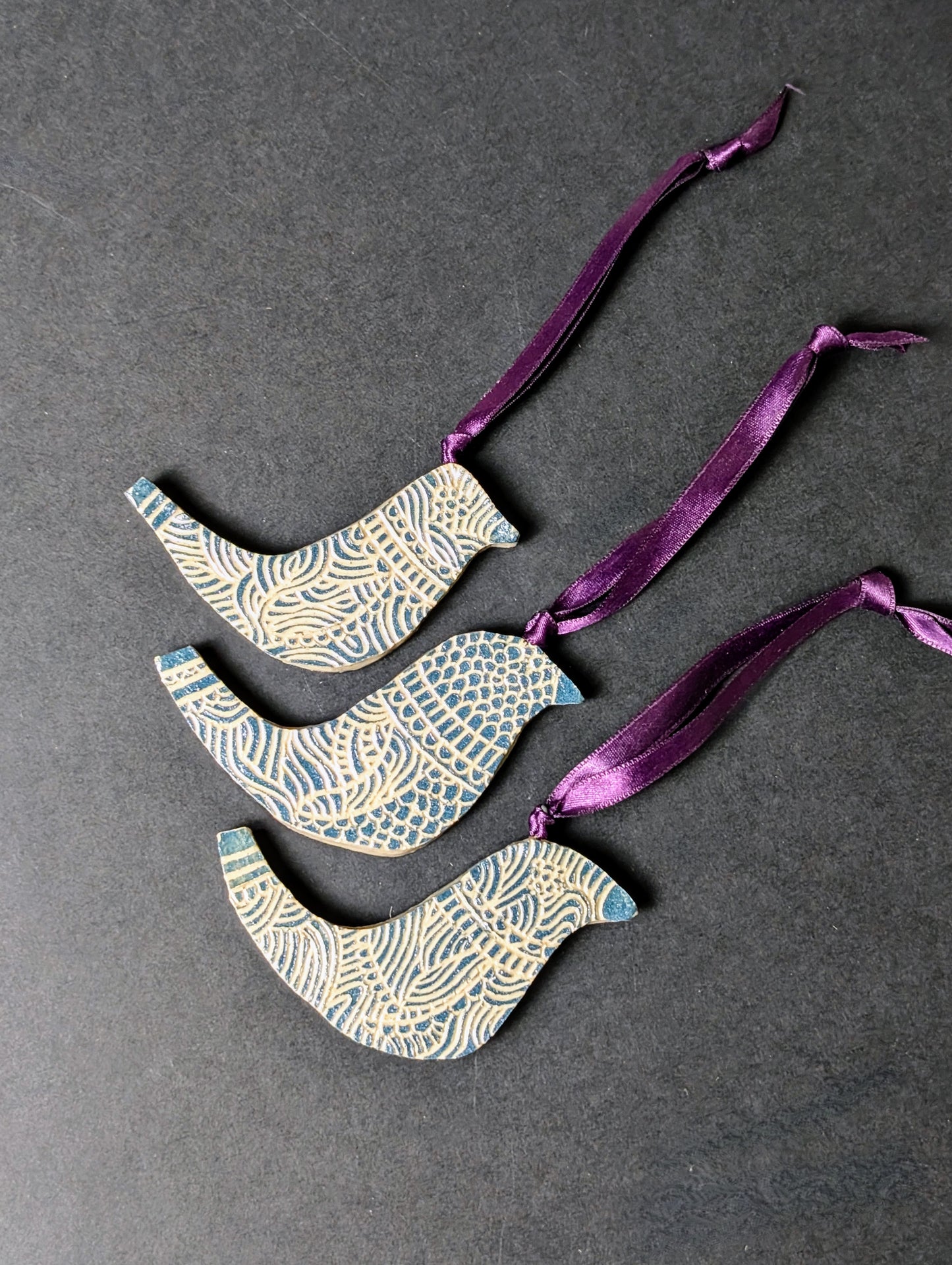 Ceramic Teal bird decoration with Sgraffito design