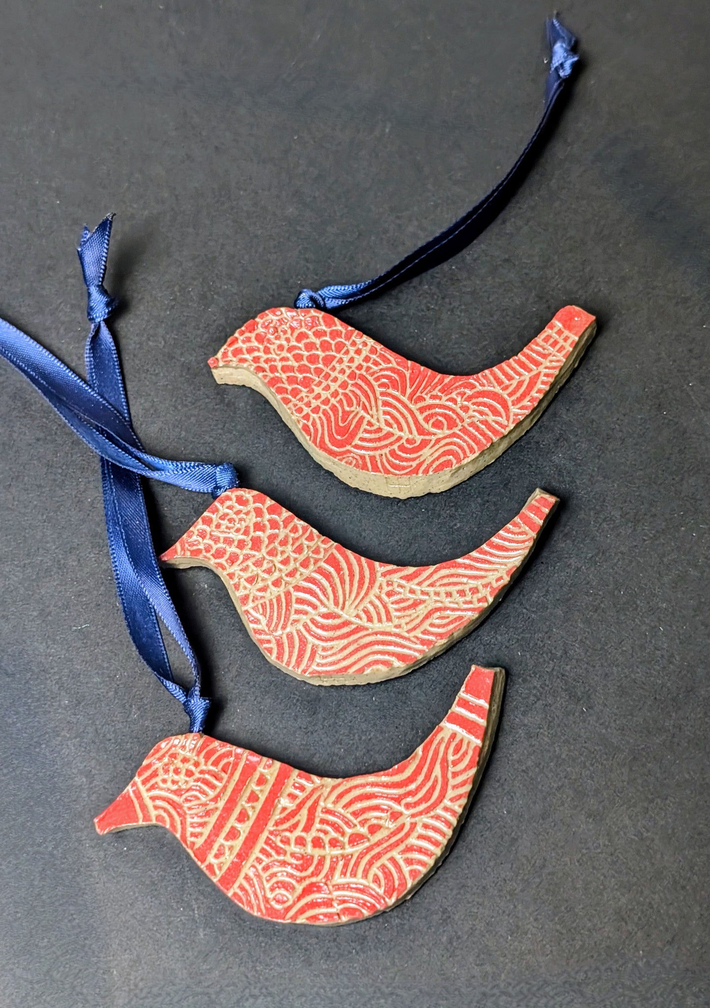 Red Bird Sgraffito Decoration with blue Ribbon hanging