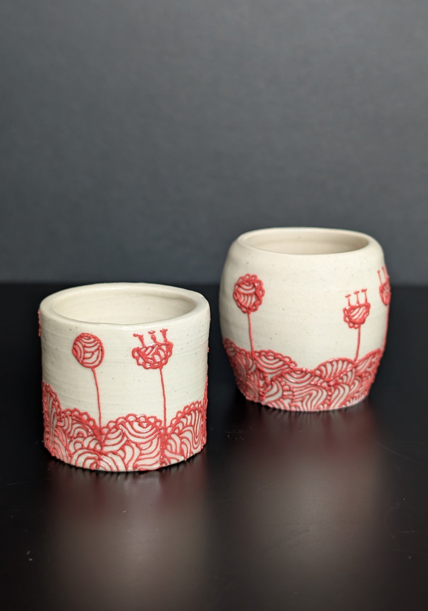 Red slip trail landscape group vase