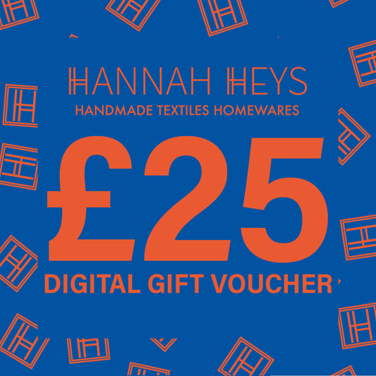Bright Blue Image with Bright Orange Lettering, advertising a £25 Digital Gift Voucher for Hannah Heys Textiles.
