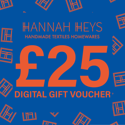 Bright Blue Image with Bright Orange Lettering, advertising a £25 Digital Gift Voucher for Hannah Heys Textiles. 