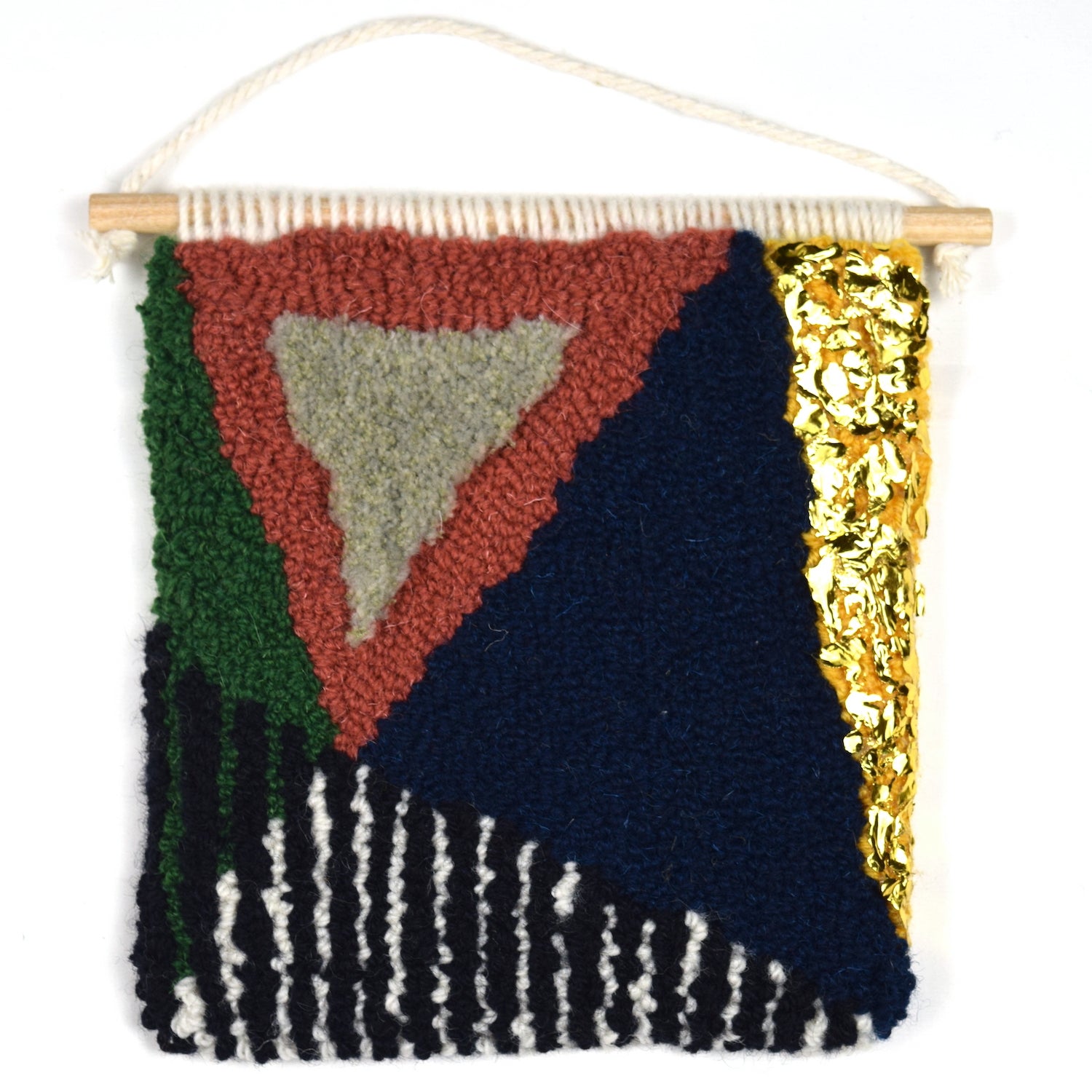 A fun mixture of FRAGMENT triangular shaped pieces created using British Wool and Reclaimed Yarns in a mixture of loop and cut piles and glorious gold accents. Coral, Khaki, Green, Navy and Yellow with a Black and White stripe.